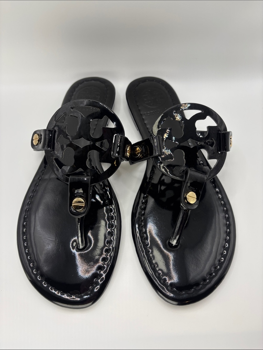 Tory Burch Black Patent Logo Thong Sandals with Gold Accents